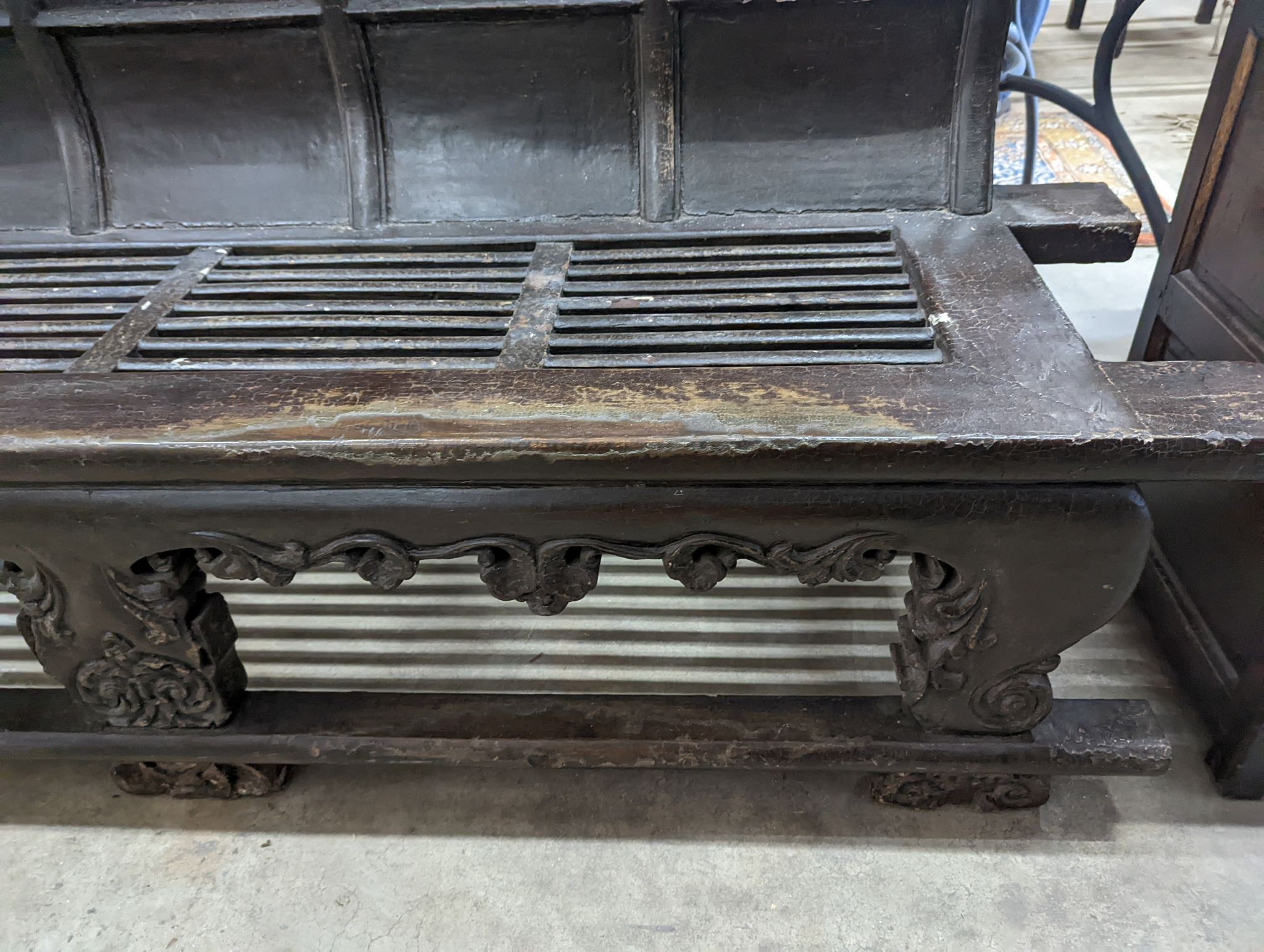An Asian lacquered opera bench, length 210cm, depth 54cm, height 106cm